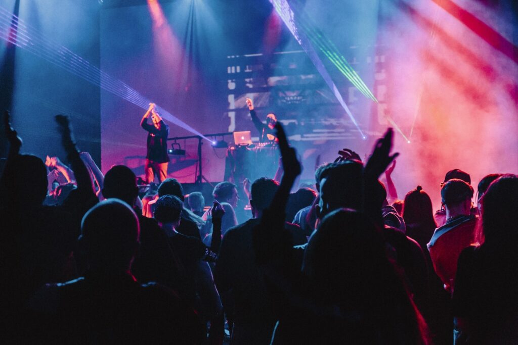 woman singing on stage
