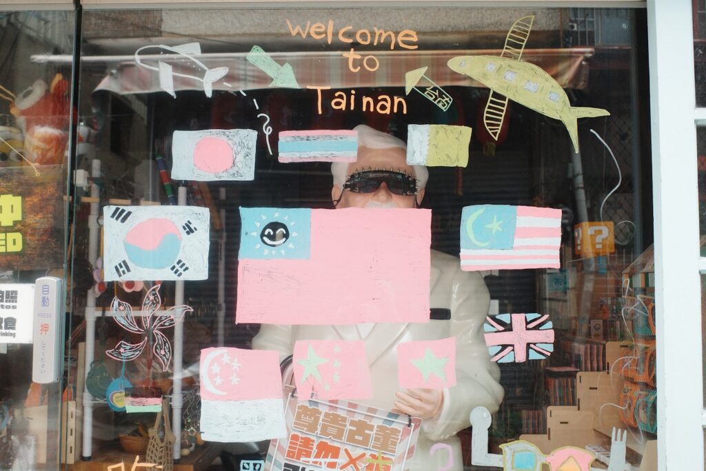 Flags and drawings on a shop window