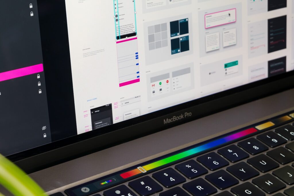 A close up of the Google Material design sticker sheet on a MacBook.
