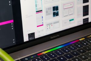 A close up of the Google Material design sticker sheet on a MacBook.